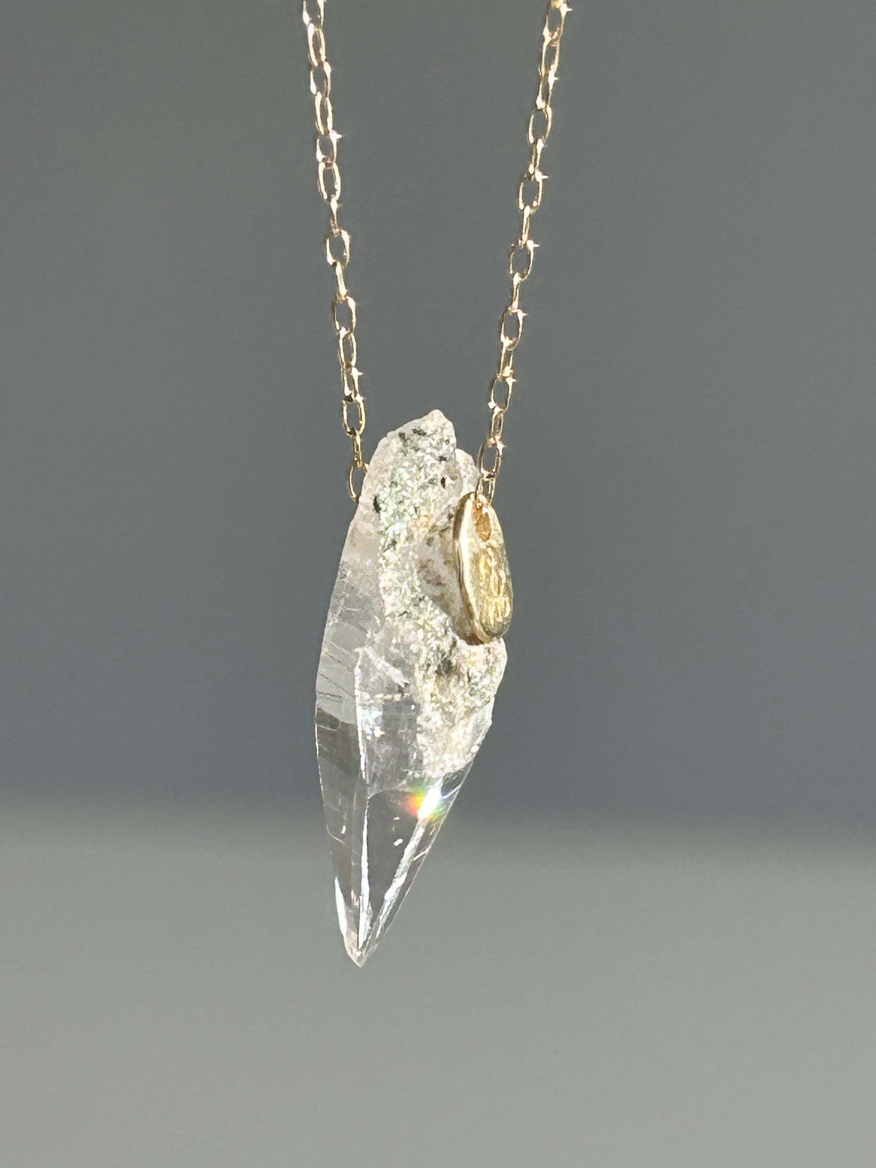 Ganesh Himal crystal. 10k necklace