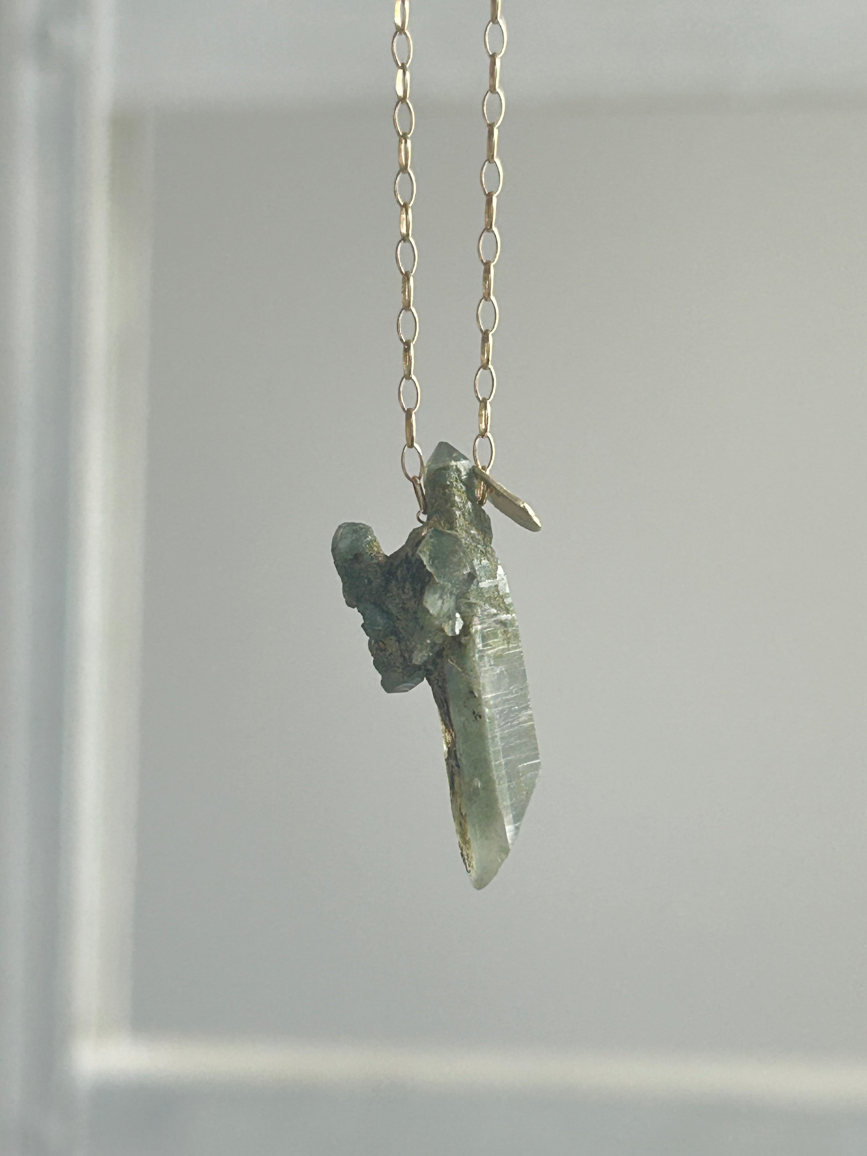 Himarayan crystal. 10k necklace