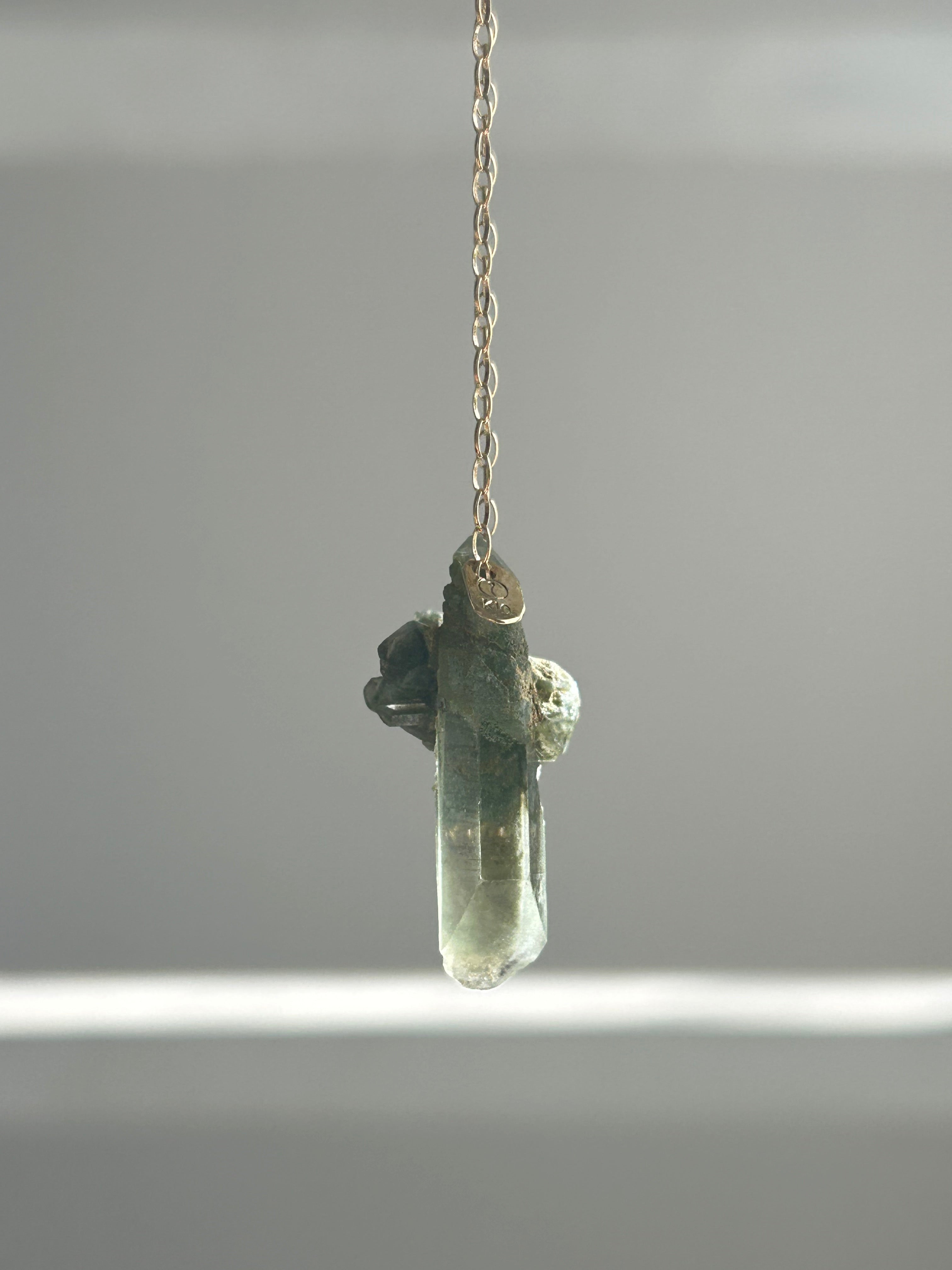 Himarayan crystal. 10k necklace