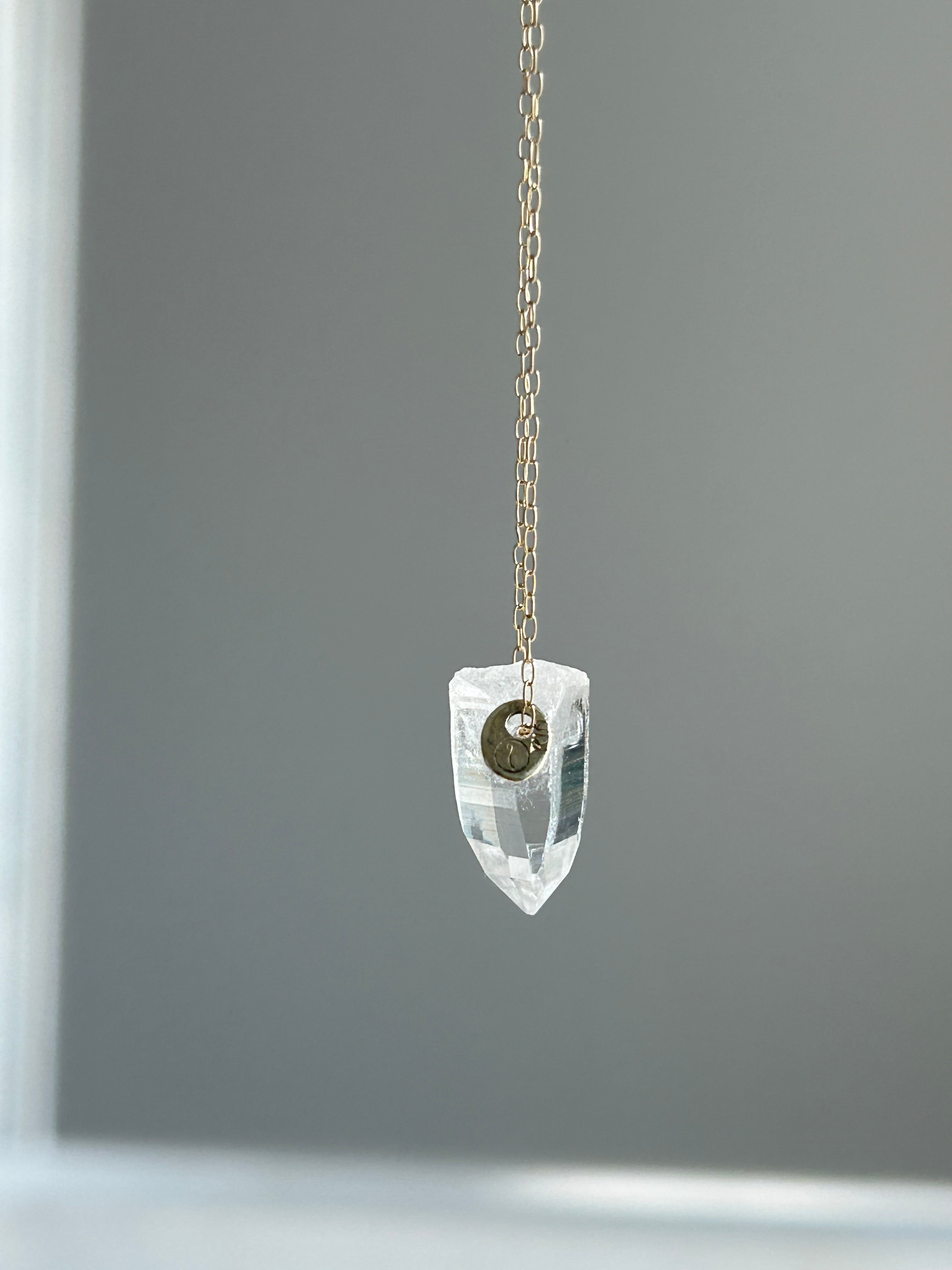 Lemurian seed crystal. 10k necklace