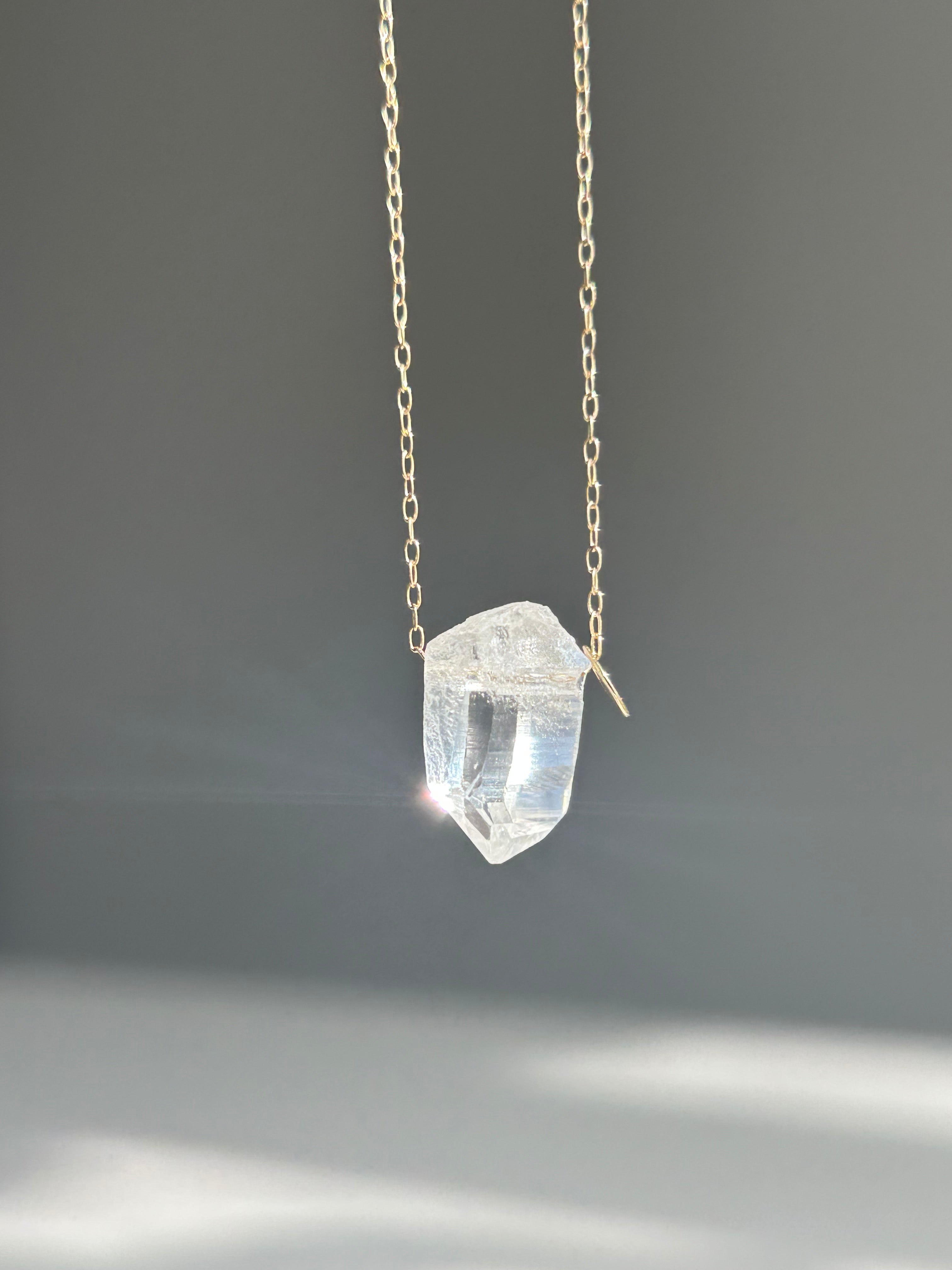 Lemurian seed crystal. 10k necklace