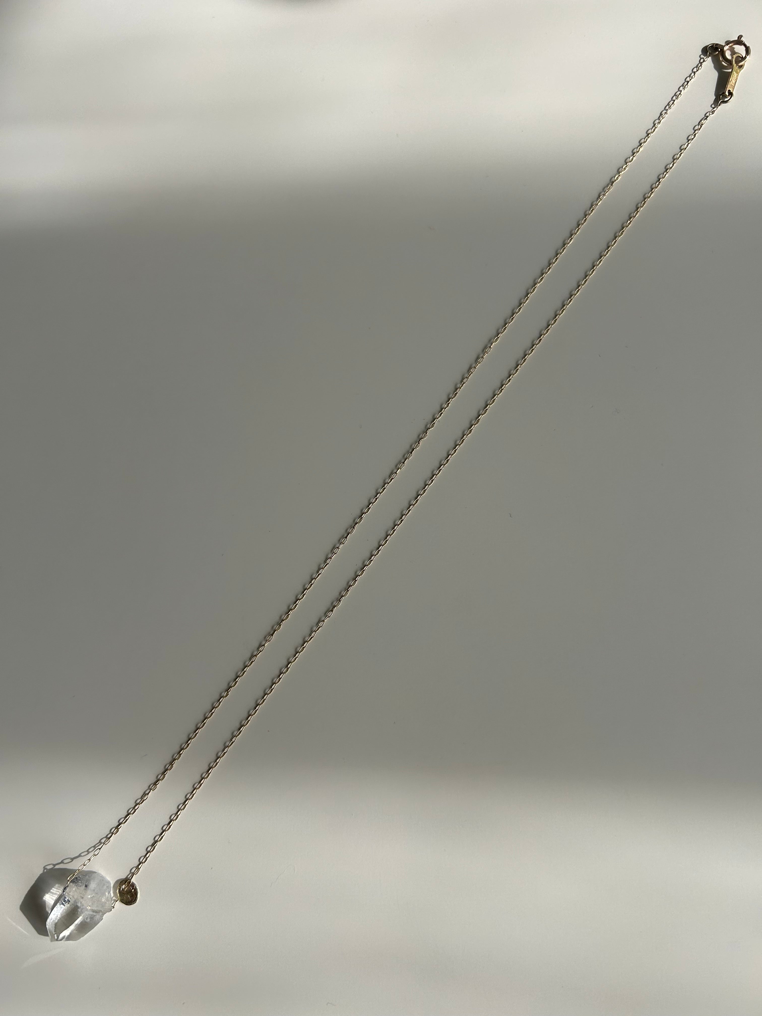 Lemurian seed crystal. 10k necklace
