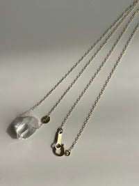 Lemurian seed crystal. 10k necklace