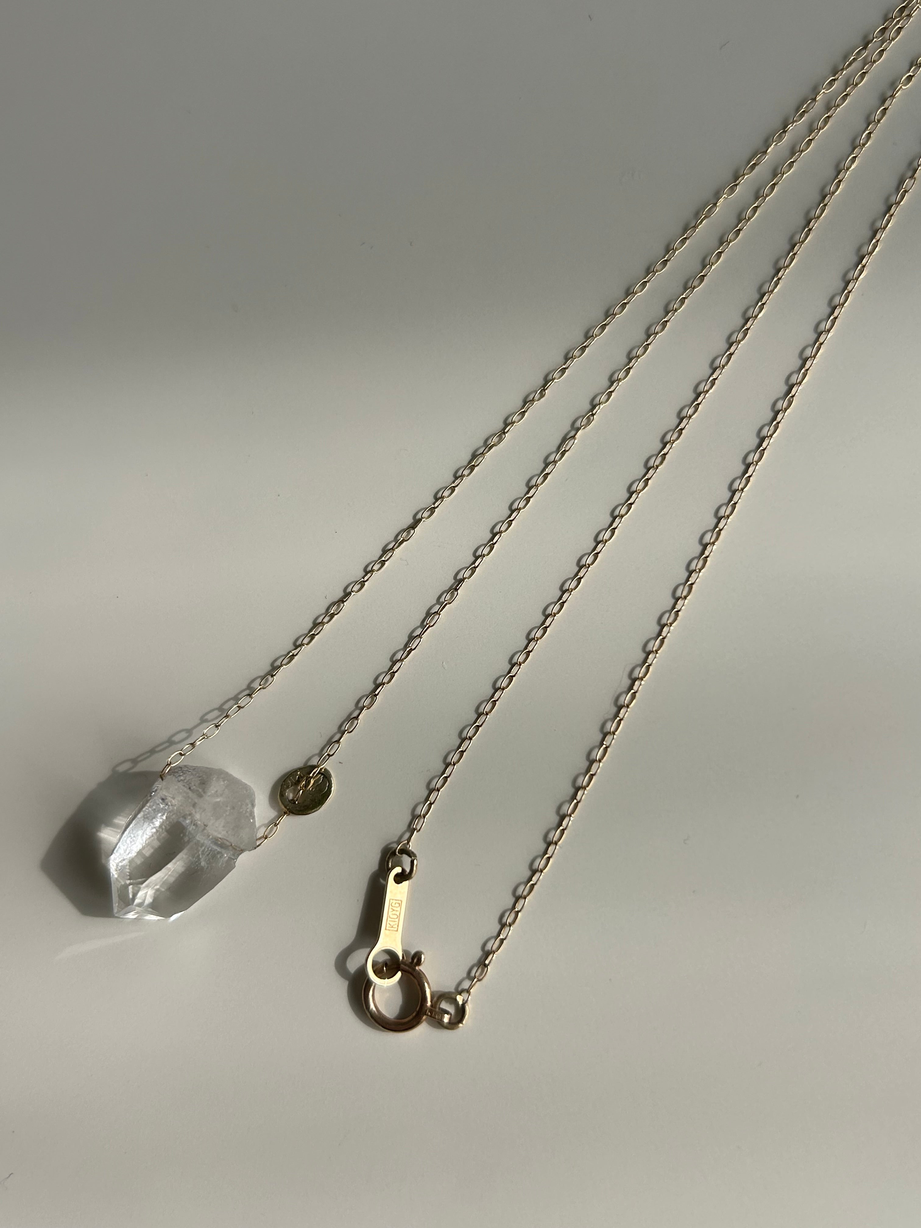 Lemurian seed crystal. 10k necklace