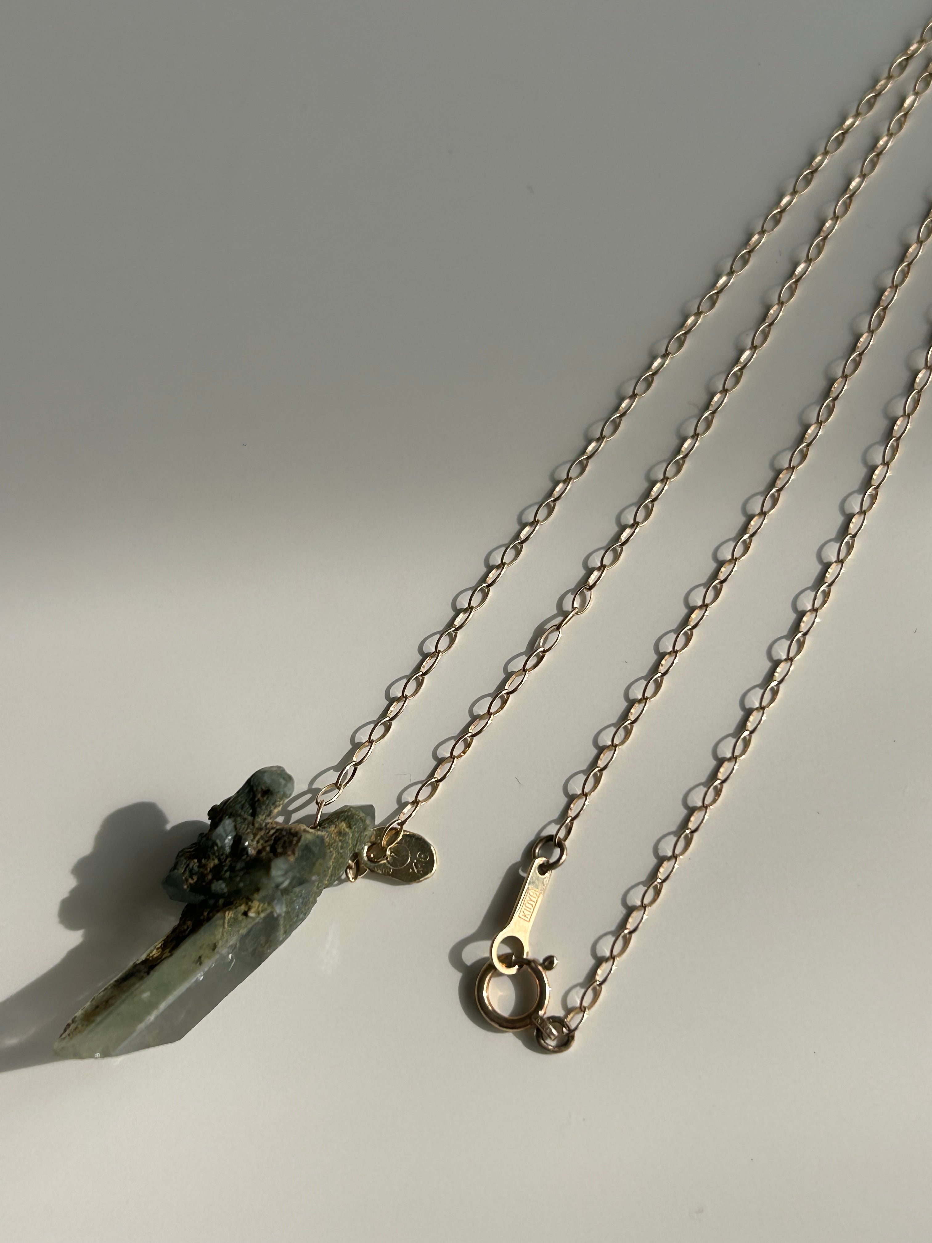 Himarayan crystal. 10k necklace